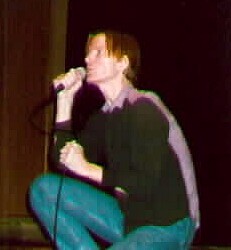 Jim Carroll singing at Cornell University Ithaca, NY, 3 March 1997
Photo by Cassie Carter"