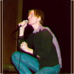 Jim Carroll singing at Cornell University Ithaca, NY, 3 March 1997
Photo by Cassie Carter"