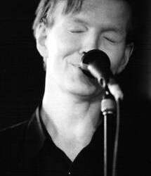 Jim Carroll at Y-Not II, Milwaukee, WI 5/7/1999 - Photo by Doug Krimmer