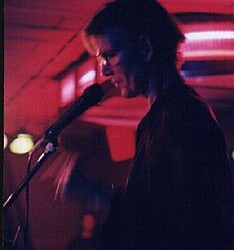 Jim Carroll at Y-Not II, Milwaukee, WI 5/7/1999 - Photo by Doug Krimmer