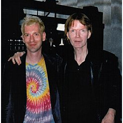 Jim Carroll with T.J. Richter at Y-Not II, Milwaukee, WI 5/7/1999 - Photo by Doug Krimmer
T.J. Richter, a performance artist (and literally a rocket scientist by training) organized the Y-Not II show.
