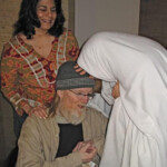 Mary Veronica Vera, Jim "Catholic Boy" Carroll, sister Linda Mary Montano. / Jim Carroll is touched by Linda Montano. I breathe it in.
Linda Montano "is a very famous performance artist and former nun and one of my mentors. She stayed at my place about a year ago when she came in for a show she was in at the Guggenheim. The next morning I took her to Balducci's so she and Jim, these two great Catholics, could meet. She also channels Mother Theresa and when she met Jim, she arrived in that mode. She blessed Jim and he took it very seriously. I felt blest just to be there." - Veronica Vera (Jim Carroll's next-door neighbor in Chelsea) Mary Veronica Vera, Jim "Catholic Boy" Carroll, sister Linda Mary Montano. / Jim Carroll is touched by Linda Montano. I breathe it in. Linda Montano "is a very famous performance artist and former nun and one of my mentors. She stayed at my place about a year ago when she came in for a show she was in at the Guggenheim. The next morning I took her to Balducci's so she and Jim, these two great Catholics, could meet. She also channels Mother Theresa and when she met Jim, she arrived in that mode. She blessed Jim and he took it very seriously. I felt blest just to be there." - Veronica Vera (Jim Carroll's next-door neighbor in Chelsea)